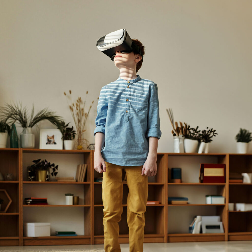 child wearing a virual reality headset at home